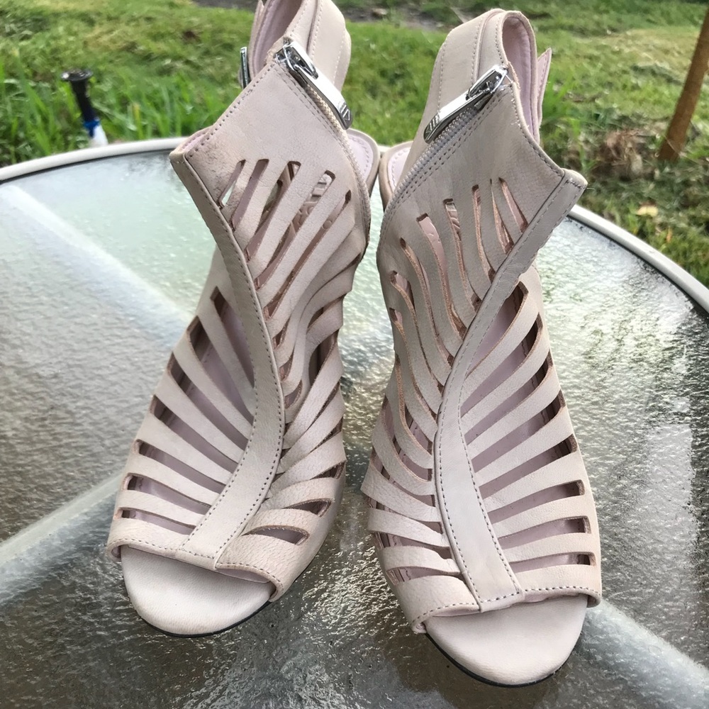 Vince Camuto tan strappy heels.